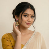Jadau kundan Antique polish jhumkas with pearl drops and natural strawberry beads
