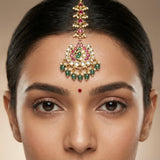 jadau kundan peacock tika with pearl drop and natural strawberry beads