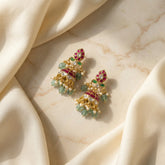 Jadau kundan leaf jhumkas with Natural Strawberry beads