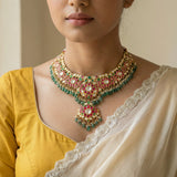 Jadau Kundan floral necklace with pearl and natural strawberry beads drops(No earrings)