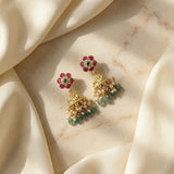 Jadau kundan antique polish jhumkas with pearl drops and natural strawberry beads