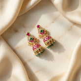 Jadau kundan jhumkas with pearl drop and natural strawberry beads