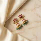 jadau kundan floral jhumkas with pearl and natural strawberry beads