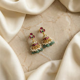 Jadau kundan jhumkas with pearl and natural strawberry beads