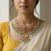 Jadau kundan bridal necklace set with pearl drop and natural strawberry beads(without earrings)