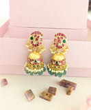Jadau kundan peacock jhumkas with pearl and natural strawberry beads drop
