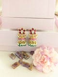 Jadau kundan floral jhumkas with pearl and natural strawberry beads drop