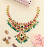 Jadau kundan necklace with pearl and natural strawberry beads drop