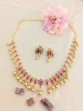 Jadau kundan peacock chain necklace with gold polish balls drop