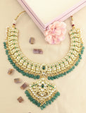 Jadau kundan leaf necklace with pearl and natural strawberry beads drop(No Earrings)