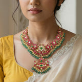 Jadau Kundan floral+peacock necklace with pearl drops and natural strawberry beads(without earrings)