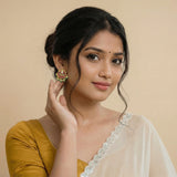 Jadau Kundan Lotus studs with natural strawberry beads