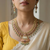 Jadau kundan Long peacock necklace set with pearl motif with matching earrings included