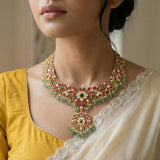 Jadau kundan peacock necklace with pearl and natural strawberry beads(without earrings)