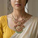 Jadau kundan long necklace with pearl drop and natural strawberry beads(No earrings)