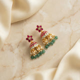 Jadau kundan floral jhumkas with pearl and natural strawberry beads drop