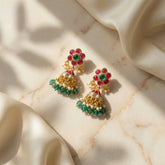 Jadau kundan jhumkas with pearl and natural strawberry beads drop