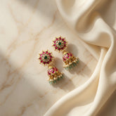 Jadau kundan jhumkas with pearl and natural strawberry beads