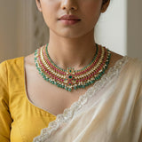 Jadau kundan necklace with pearls and natural strawberry beads
