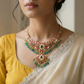 Jadau kundan necklace with pearl and natural strawberry beads drop
