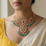 jadau kundan peacock necklace with center craving stone, pearls and natural strawberry beads drop(No earrings)