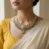 Jadau kundan peacock necklace with pearl and natural strawberry beads drop(No earrings)