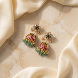 Jadau kundan jhumkas with pearl and natural strawberry beads