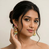Jadau kundan floral jhumkas with natural strawberry beads drop