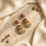Jadau kundan floral jhumkas with natural strawberry beads drop