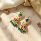 Jadau kundan jhumkas with pearl and natural strawberry beads drop