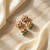 Jadau kundan jhumkas with pearl and natural strawberry beads drop