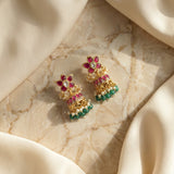 Jadau kundan floral jhumkas with pearl and natural strawberry beads drop
