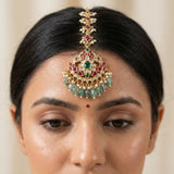 Jadau kundan peacock tika with pearl and natural strawberry beads drop