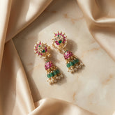 Jadau kundan peacock Jhumkas with pearl and natural strawberry beads drop
