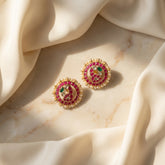 Jadau kundan peacock studs with pearls