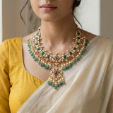 Jadau kundan necklace with carving stone, pearl and natural strawberry beads