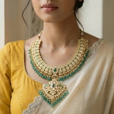 Jadau kundan leaf necklace with pearl and natural strawberry beads drop(No Earrings)