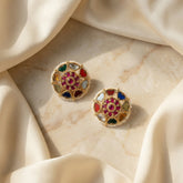Jadau kundan navratna studs with pearl motif