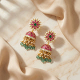 Jadau kundan jhumkas with pearl and natural strawberry beads drop