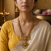 Temple/Antique Goddess laxmi peacock long necklace with pearl and natural strawberry beads drop(With Earrings)