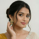 Jadau kundan peacock jhumkas with pearl drops and natural strawberry beads