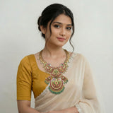Jadau kundan long necklace with pearl drop and natural strawberry beads(No earrings)