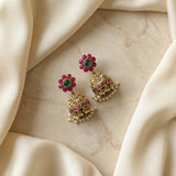 Jadau kundan Antique polish jhumkas with pearl drops and natural strawberry beads