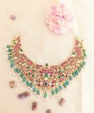 Jadau Kundan Floral Necklace with Rice Pearls and Natural Strawberry Beads
