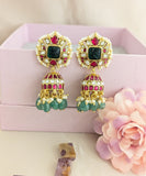 Jadau Kundan craving stone floral Jhumkas with Pearls and Natural Strawberry Beads