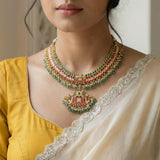 Jadau kundan peacock necklace with pearl drops and natural strawberry beads(without earrings)
