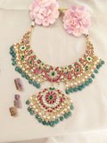 Jadau kundan necklace with pearl and natural strawberry beads drop