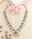 Jadau kundan floral half moon pendant with pearl and natural strawberry beads