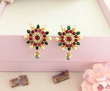 Jadau kundan floral studs with pearl and natural strawberry beads