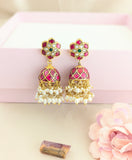 Jadau kundan jhumkas with pearl and natural strawberry beads drop